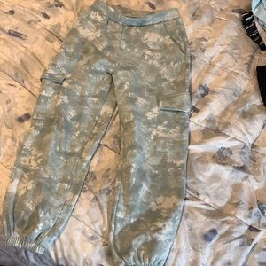 Pale green + white marbled/tie dyed cargo joggers